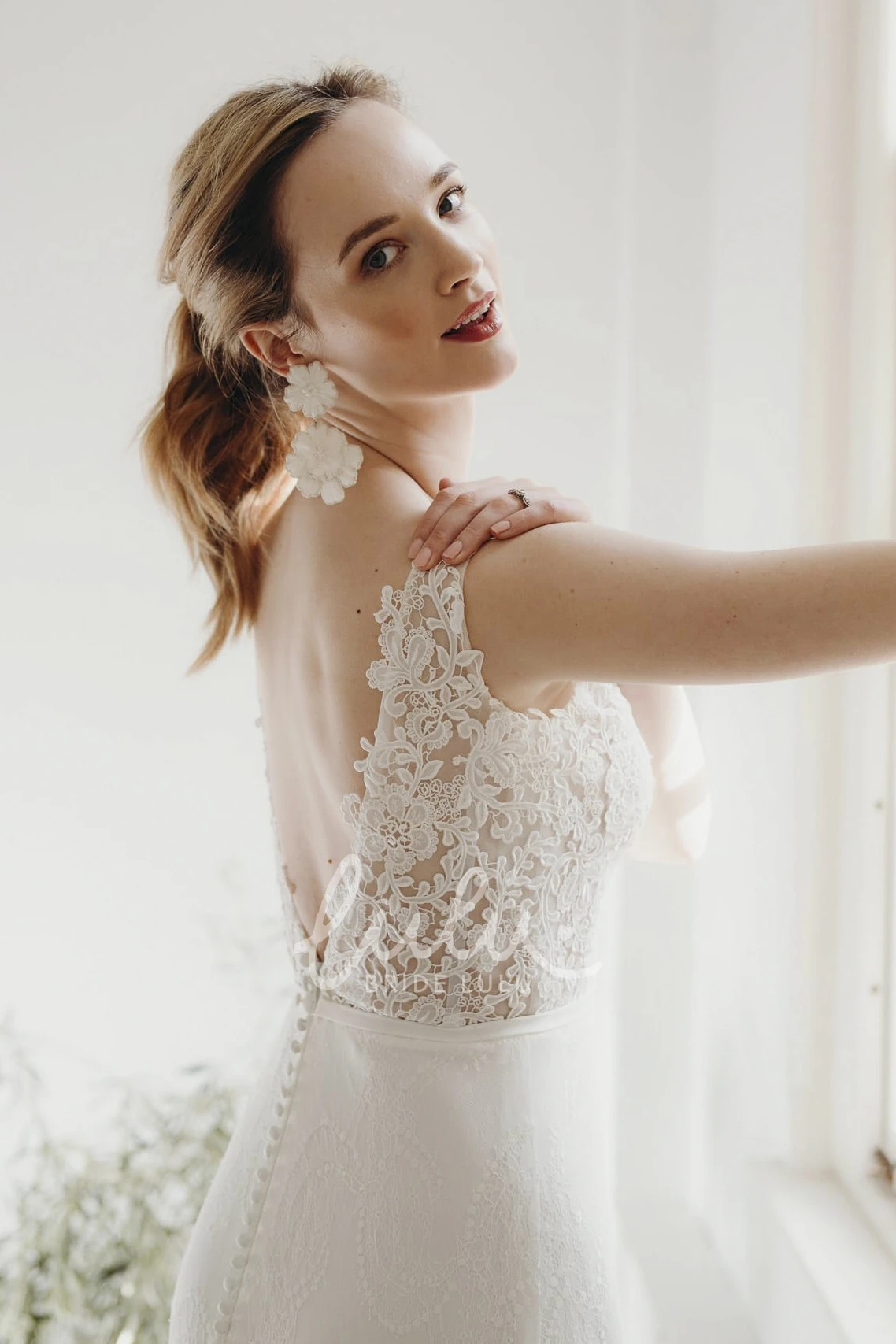 Sleeveless Lace Sheath Wedding Dress with Plunging V-neck and Deep V-back Buttons