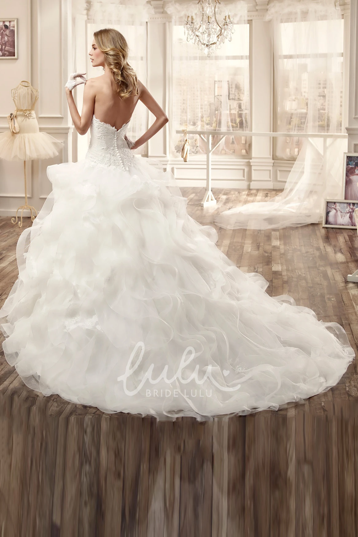 Strapless Wedding Dress with Cascading Ruffles and Low Back Romantic Bridal Gown