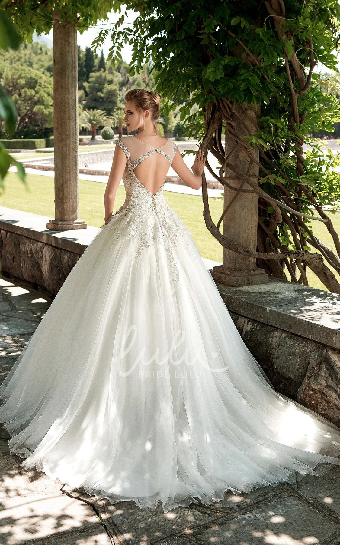 Cap-Sleeve Tulle A-Line Winter Wedding Dress with Beading and Appliques