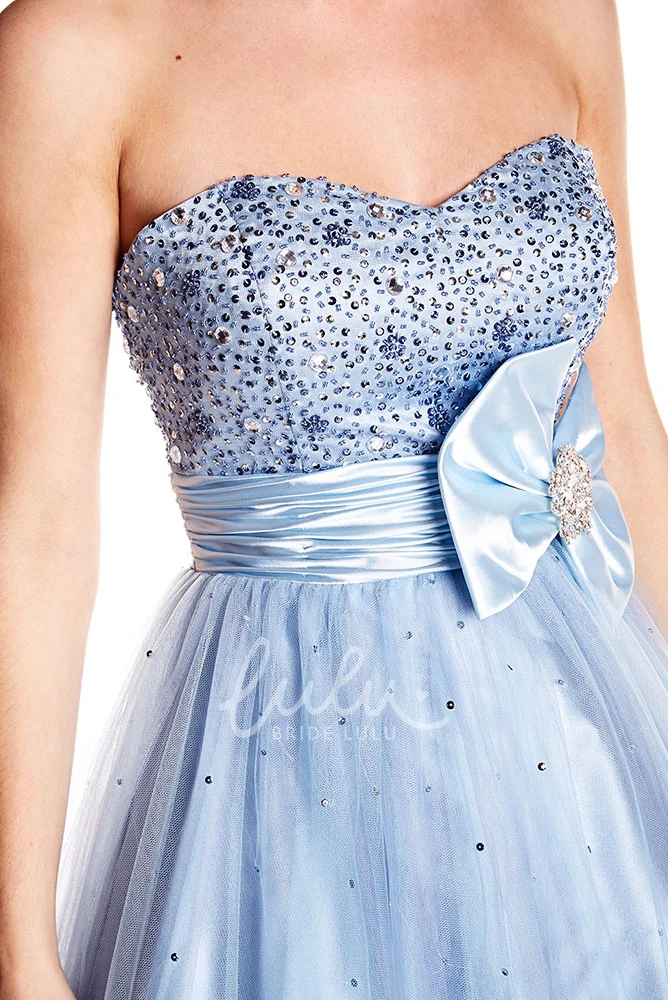 Long A-Line Tulle and Satin Prom Dress with Beaded Bodice and Strapless Design