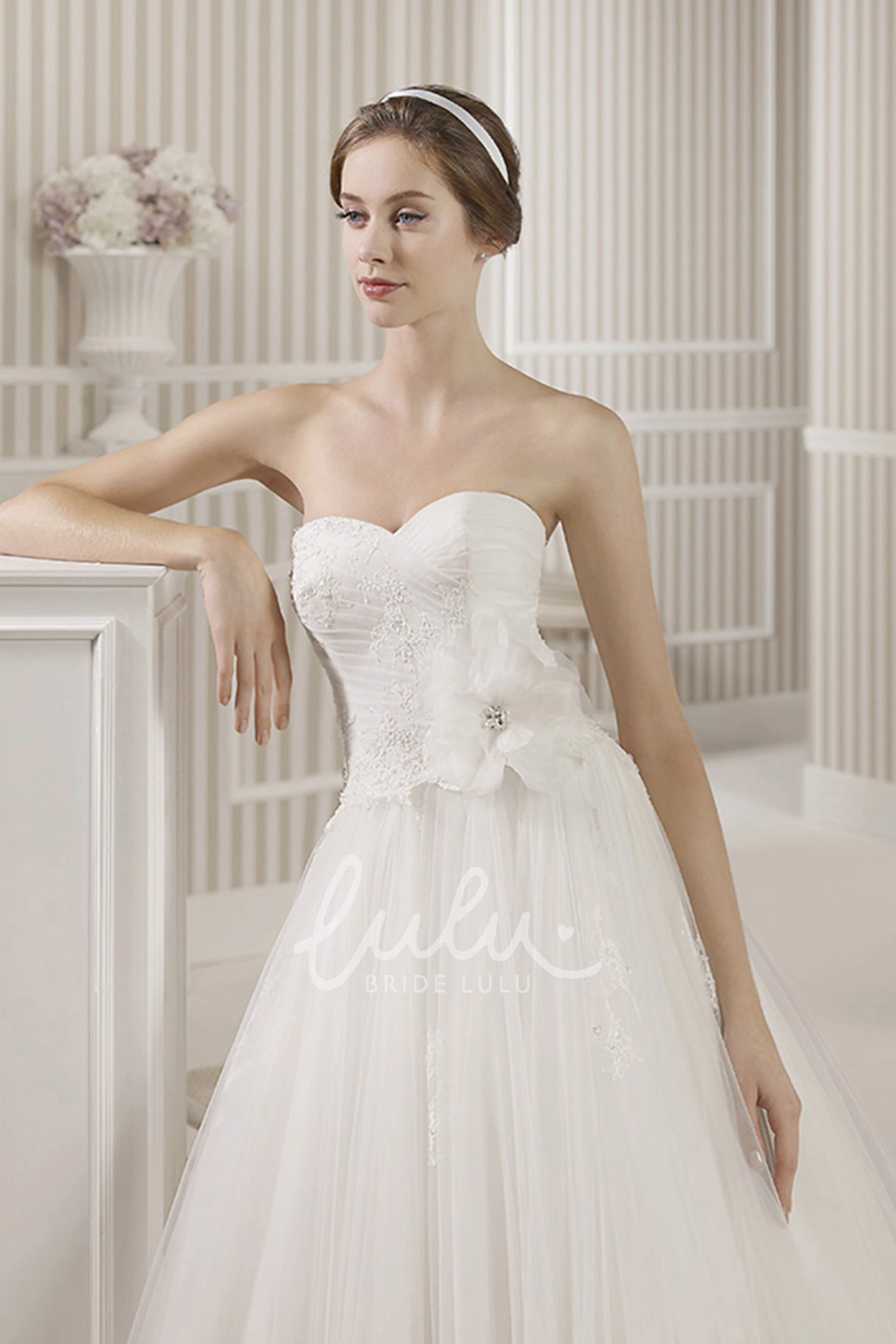 Sweetheart Ball Gown Wedding Dress with Tulle Appliques and Criss Cross