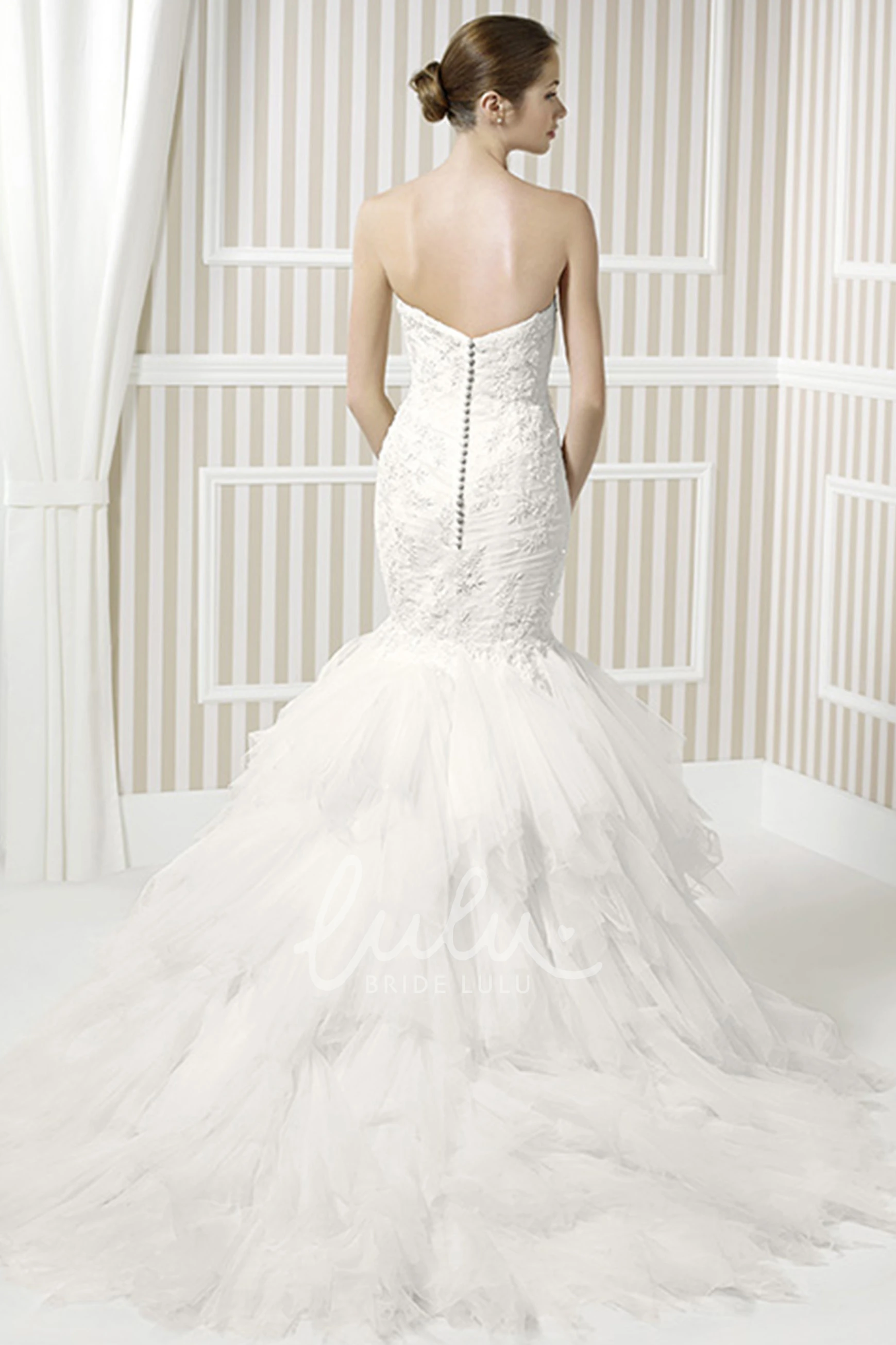 Sleeveless Trumpet Tulle Wedding Dress with Cascading Ruffles Appliques and Sweetheart Neckline