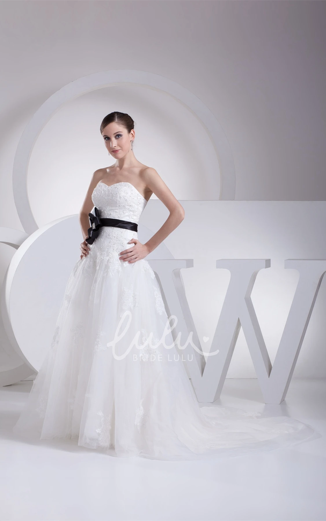 Lace Tulle A-Line Wedding Gown with Appliques and Beaded Bow Elegant A-Line Wedding Gown with Lace Tulle Appliques and Beaded Bow