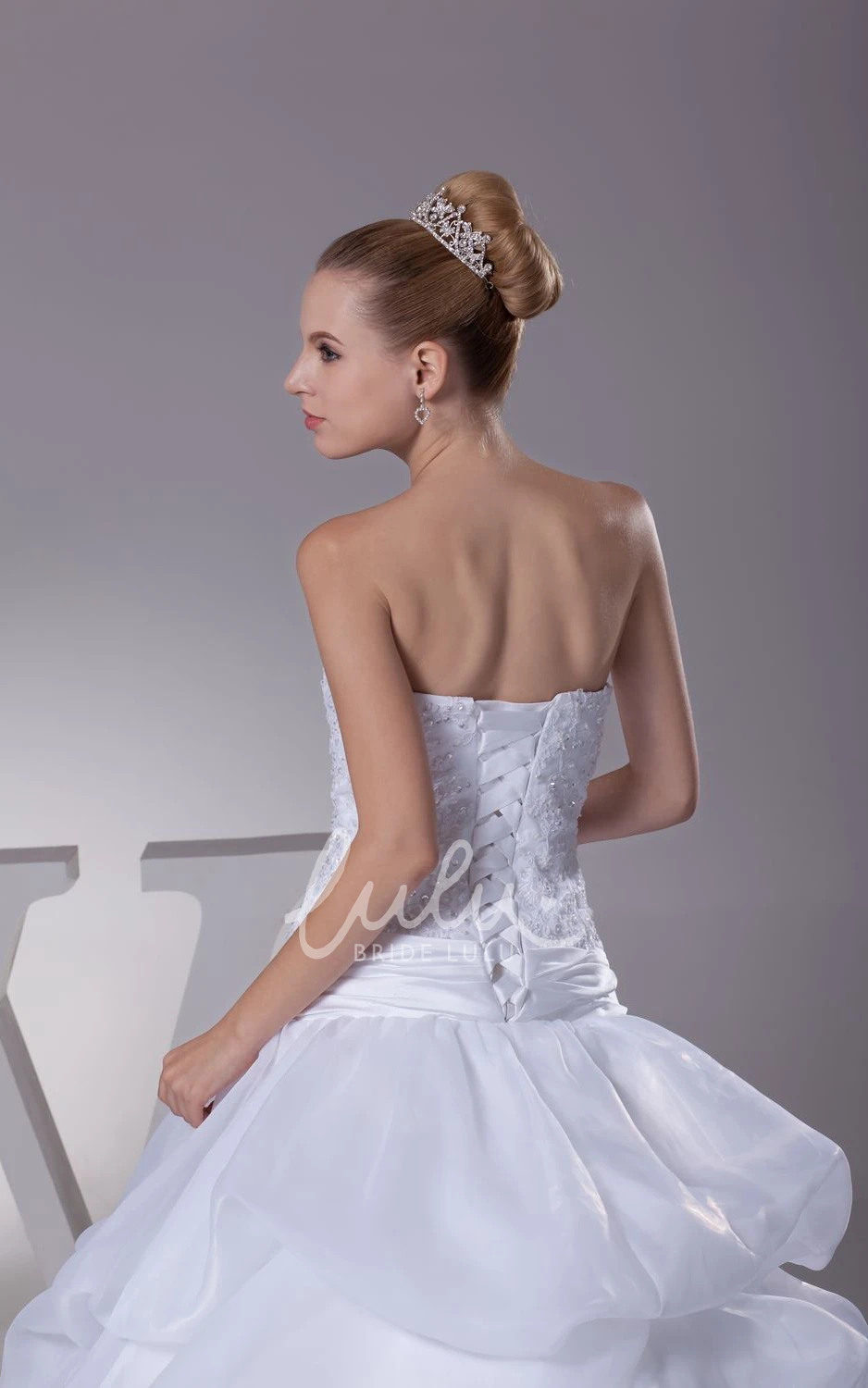 Appliqued A-Line Organza Wedding Dress With Pick-Up Design and Strapless Neckline