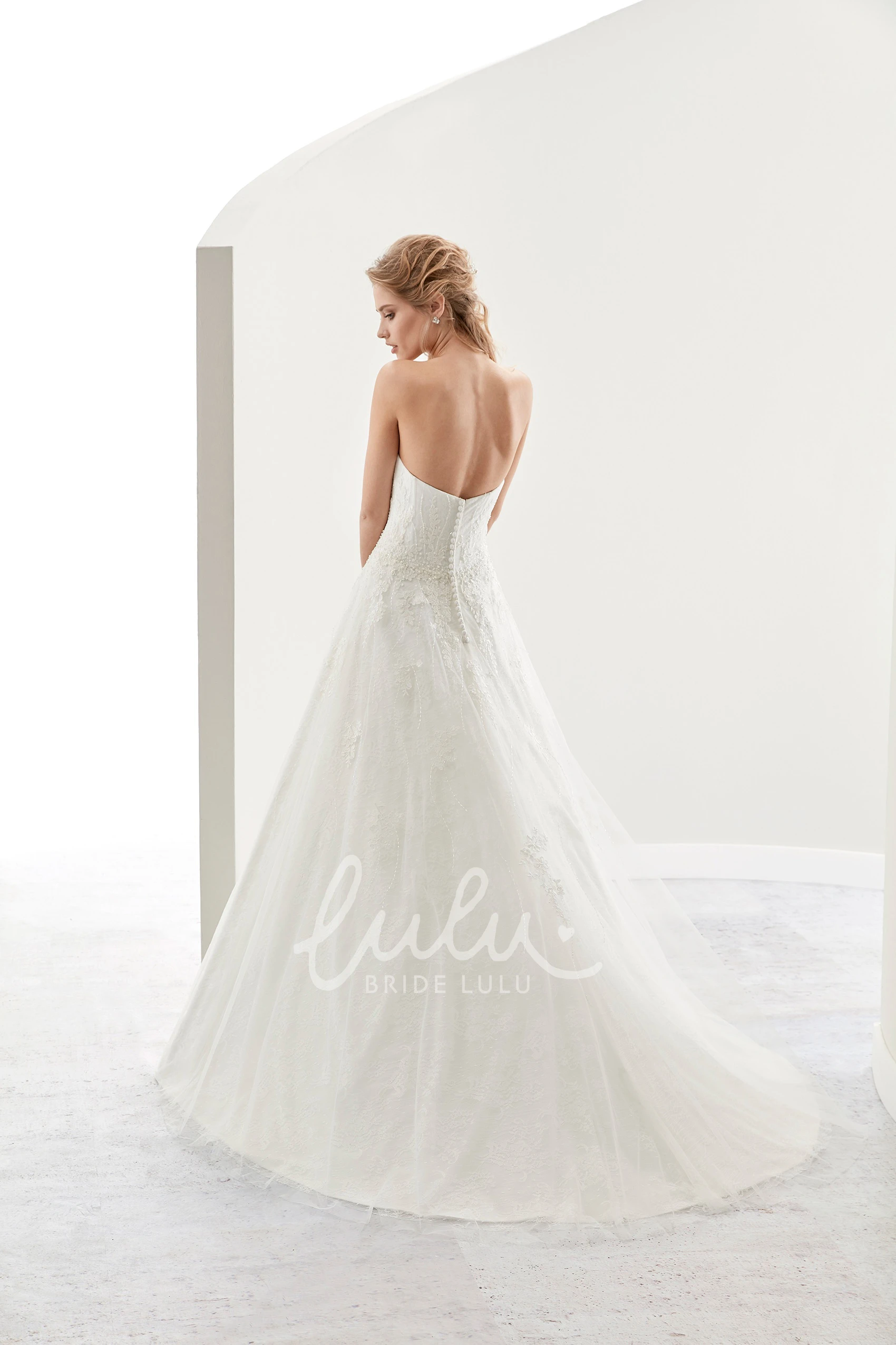 Lace Applique A-Line Wedding Dress with Brush Train and Strapless Design