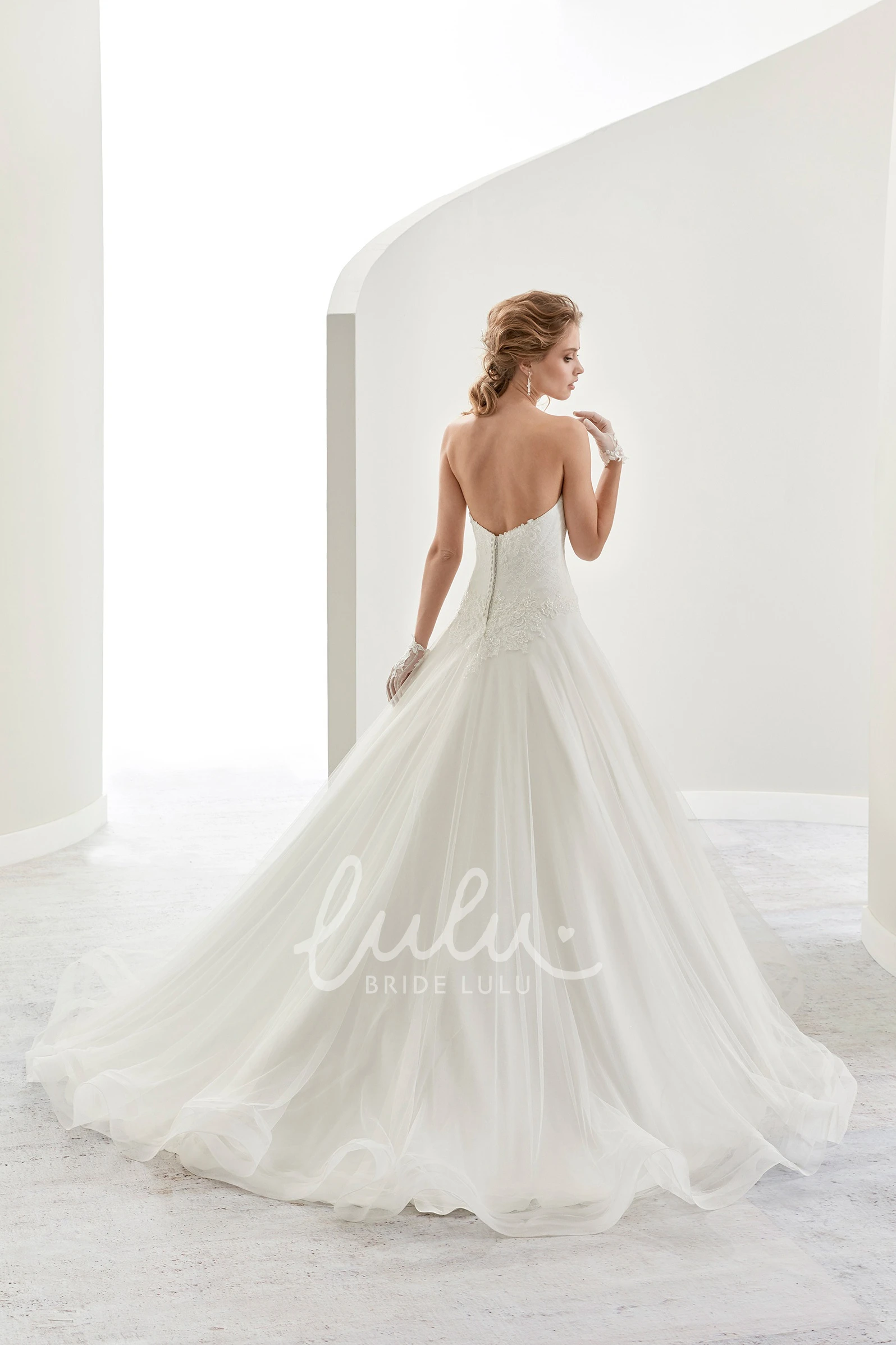 A-Line Sweetheart Wedding Dress with Appliques and Ruffles Elegant Bridal Gown