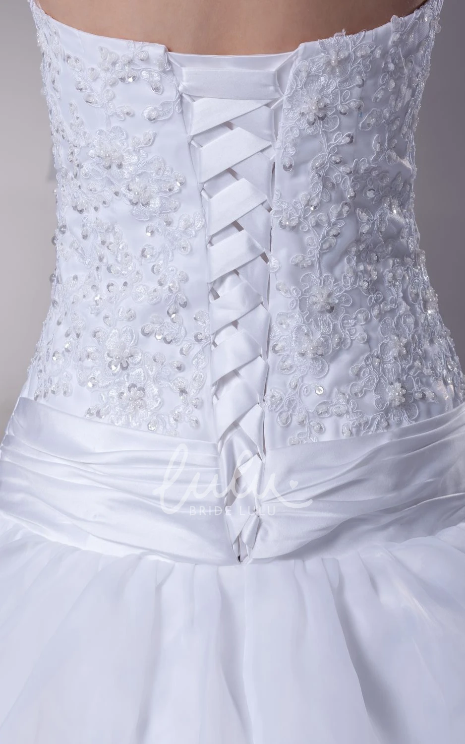 Appliqued A-Line Organza Wedding Dress With Pick-Up Design and Strapless Neckline