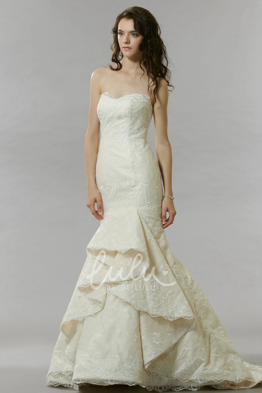 Strapless Mermaid Wedding Dress with Applique Detail Draping and Court Train