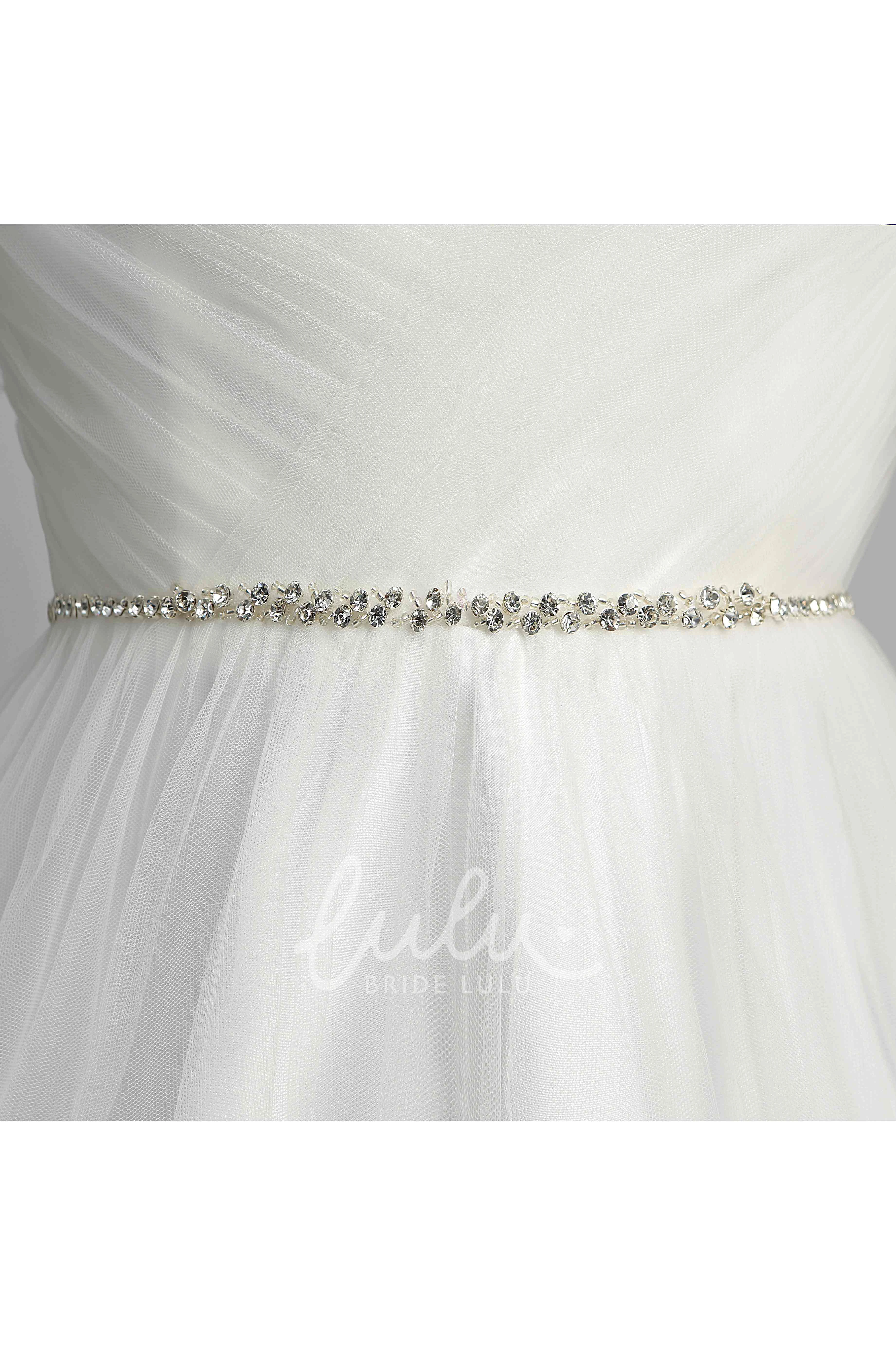 Tulle A-line Wedding Dress with Off-the-shoulder Neckline Spaghetti Straps Bell Sleeves and Illusion Details