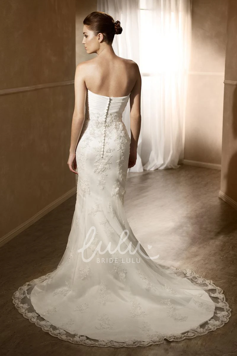 Lace Mermaid Wedding Dress with Sweetheart Neckline and Floral Detailing