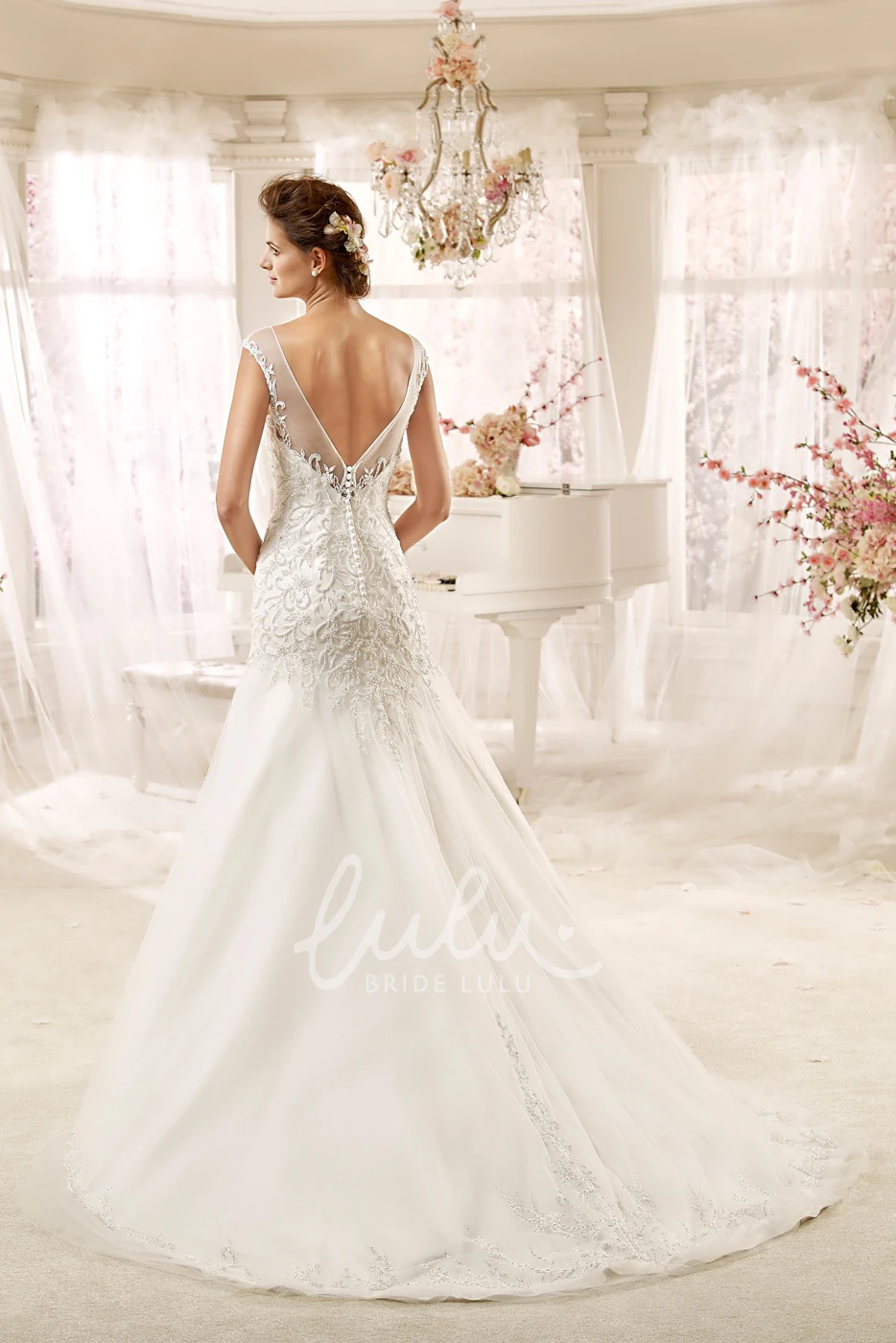 Illusion Wedding Gown with Beaded Appliques and Open Back Unique Wedding Dress