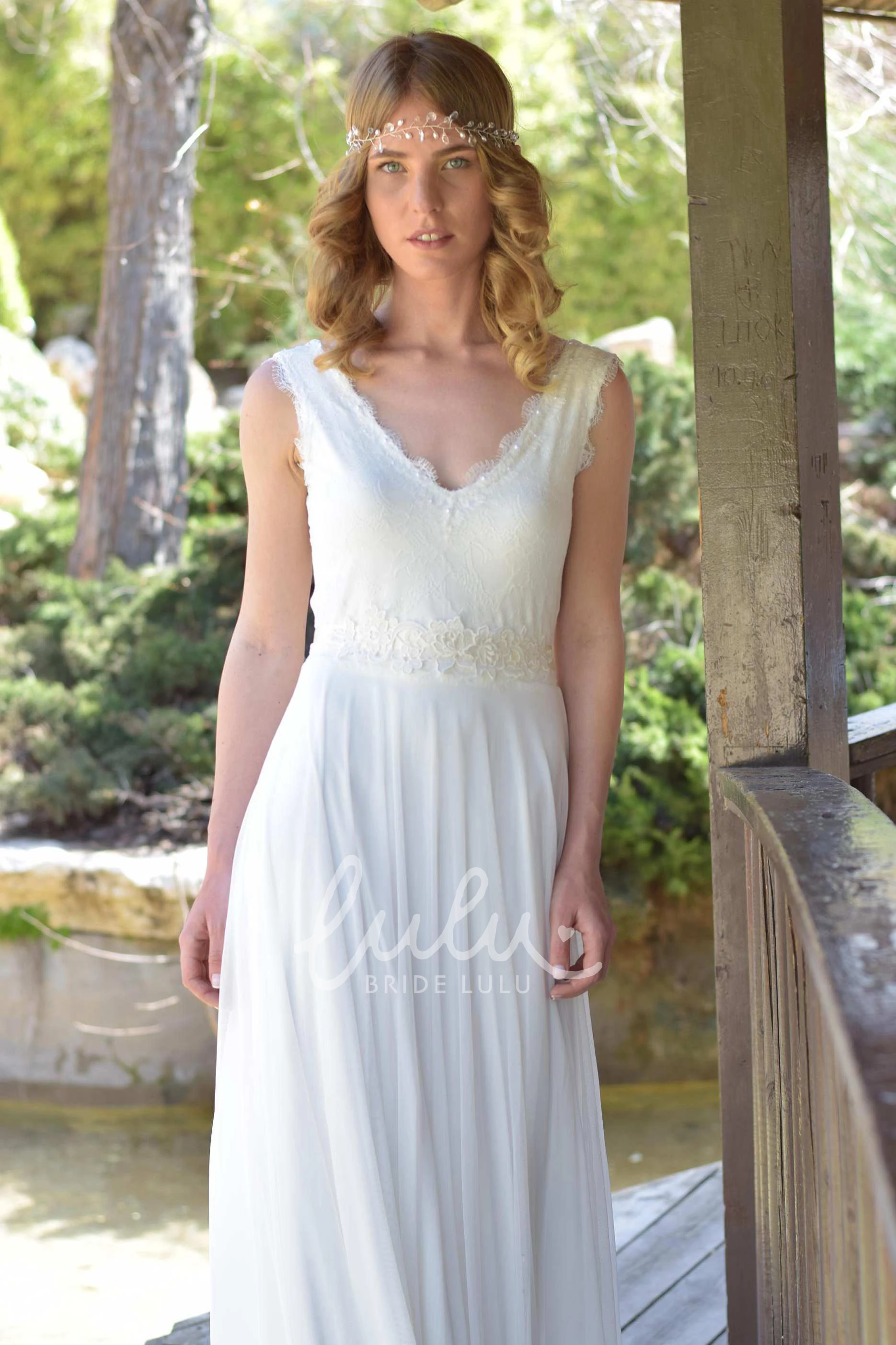 Sleeveless Chiffon Lace Wedding Dress with Plunging Neckline and Bow Detail