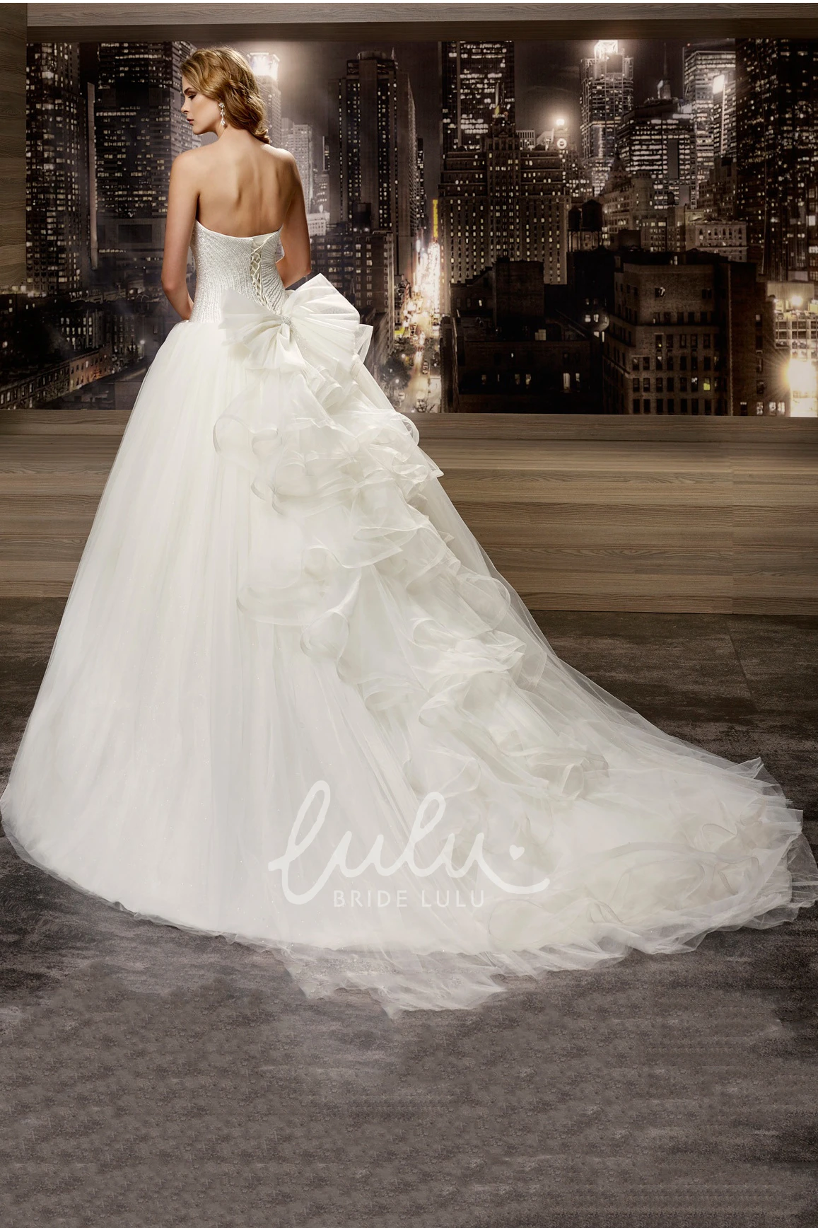Beaded Sweetheart A-Line Wedding Dress with Back Ruffles Bow