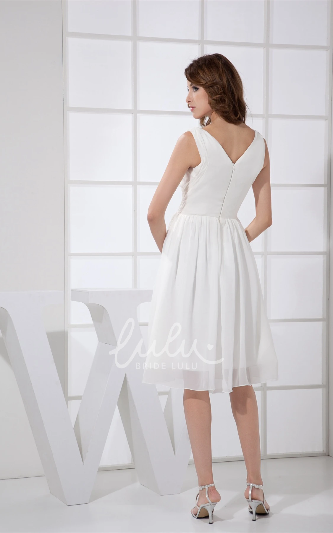 Knee-Length Pleated Dress with Ruching Chic & Flattering