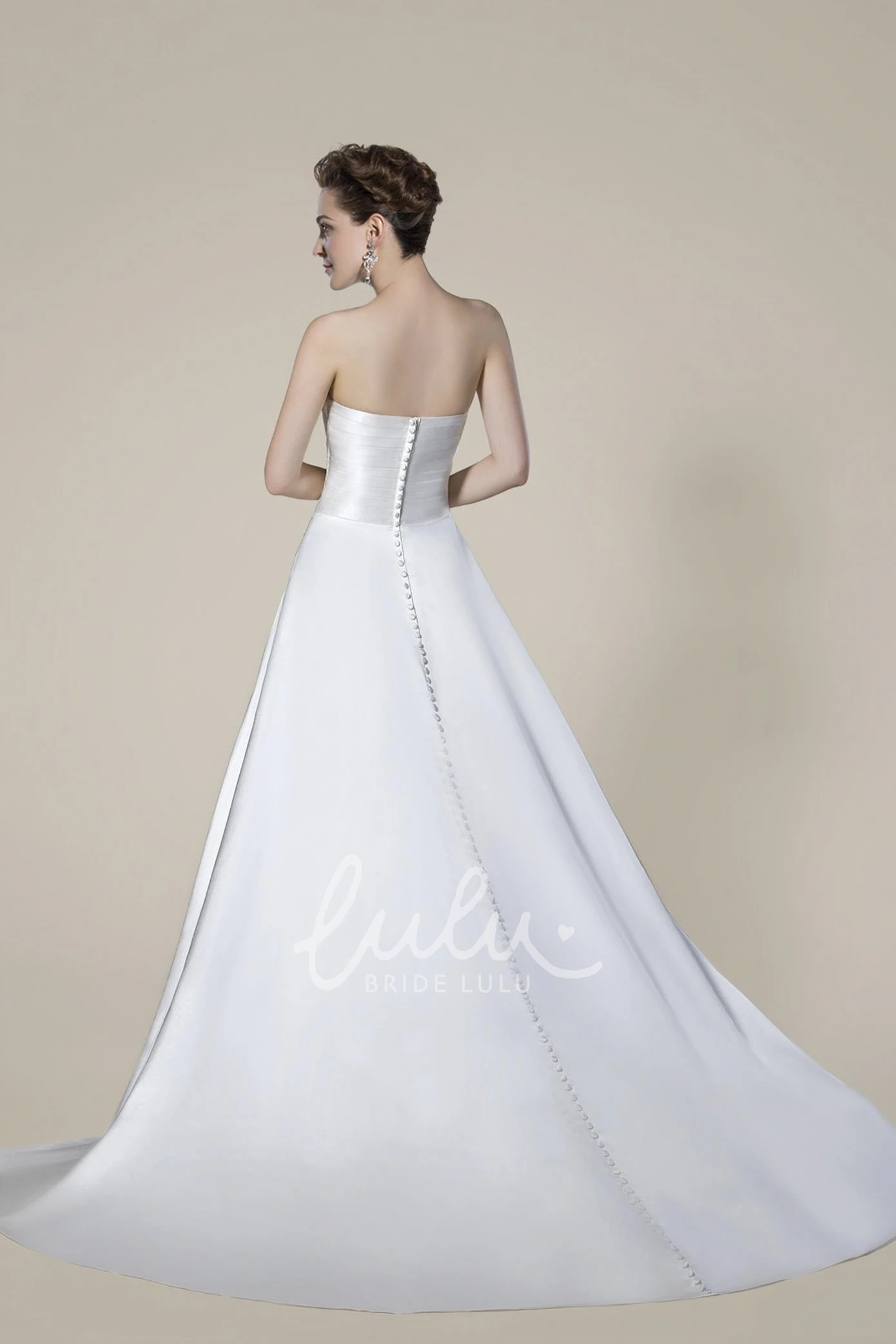 Elegant Strapless Beaded Wedding Dress with Draping and Criss Cross Back
