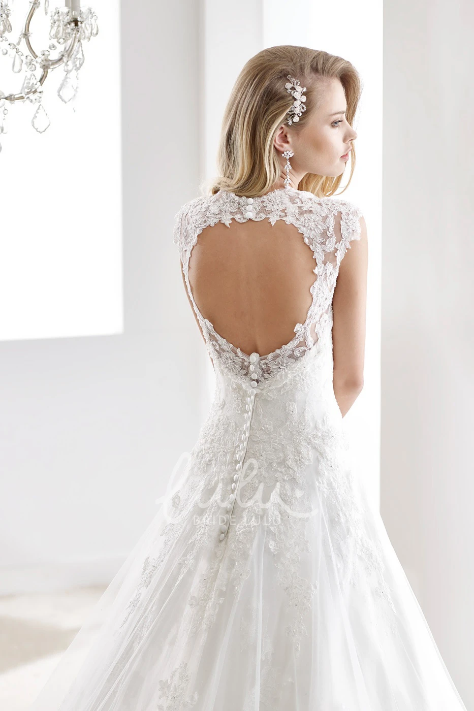 Sweetheart Mermaid Lace Wedding Gown with Bow Shoulder Detail and Open Back