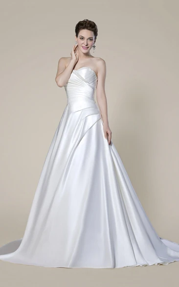 Elegant Strapless Beaded Wedding Dress with Draping and Criss Cross Back