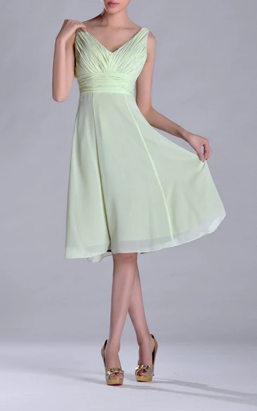 Empire Knee-length Chiffon Bridesmaid Dress with Deep-V Back