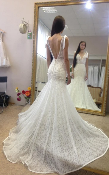 Sleeveless Mermaid Lace Wedding Dress with Long Train and Deep-V Neck