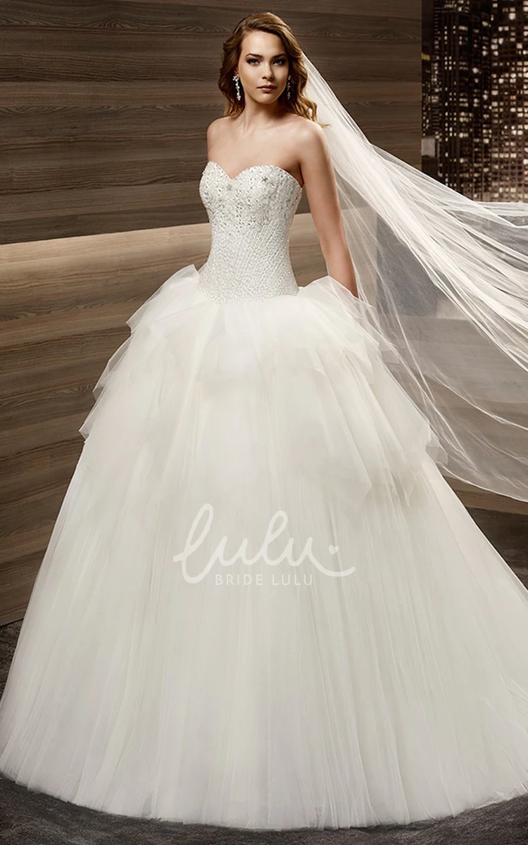 Pleated Sweetheart Wedding Dress with Beaded Corset and Ruffled Skirt