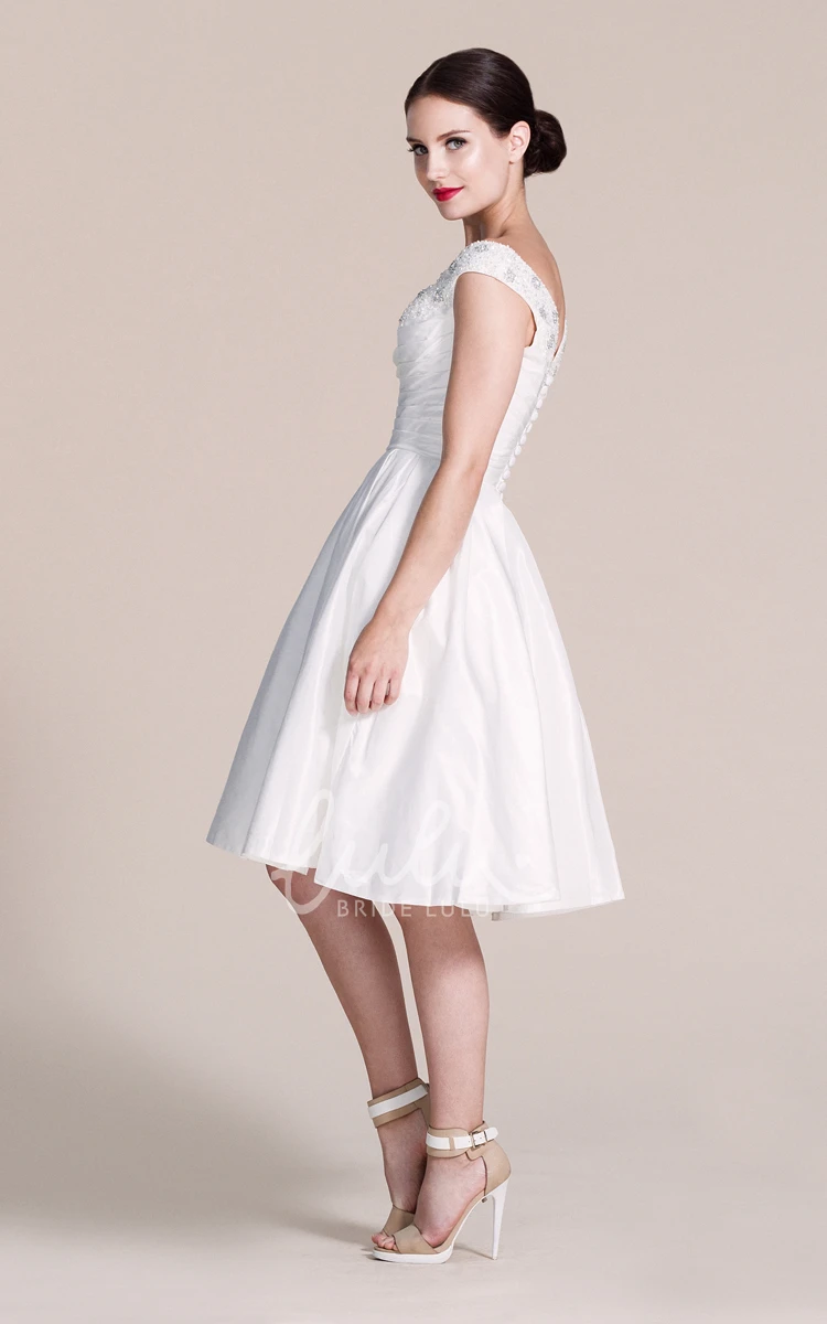 Cap-sleeved A-line Wedding Dress With Pleats and Beadings V-neck