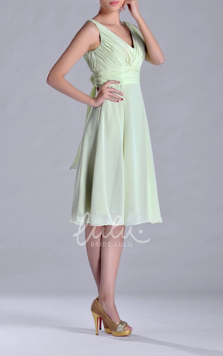 Empire Knee-length Chiffon Bridesmaid Dress with Deep-V Back