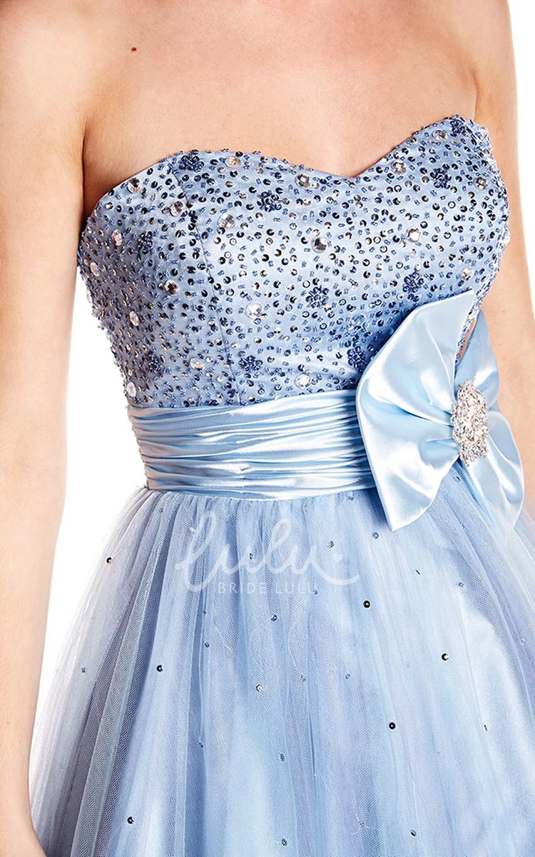 Long A-Line Tulle and Satin Prom Dress with Beaded Bodice and Strapless Design