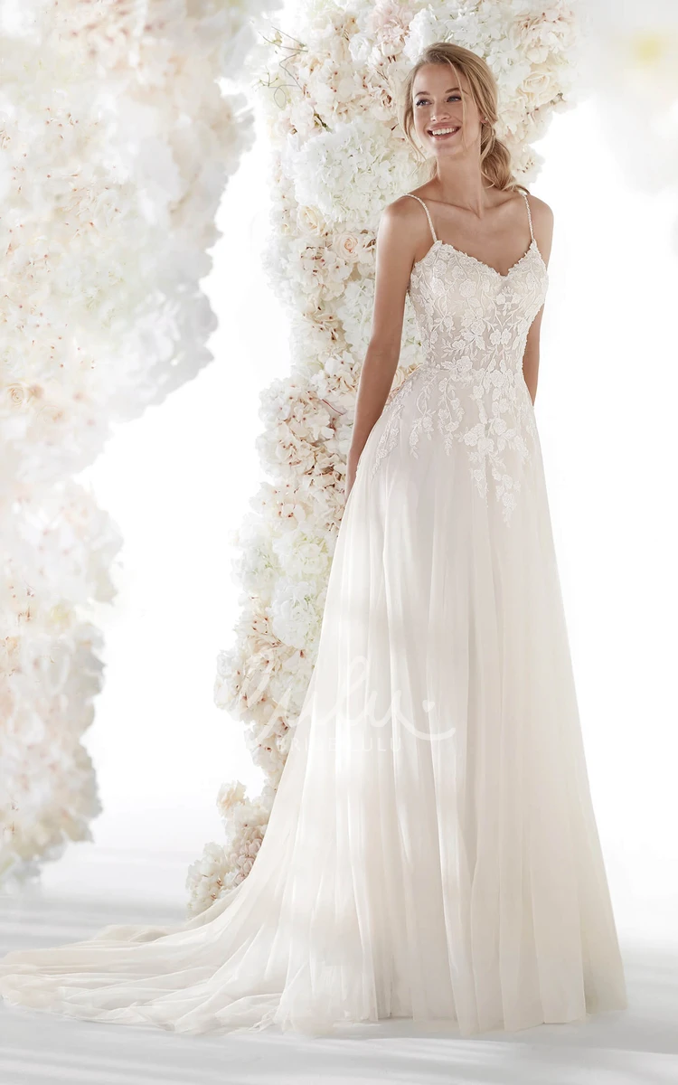 Ethereal Tulle Bridal Gown with Spaghetti Straps and Open Back