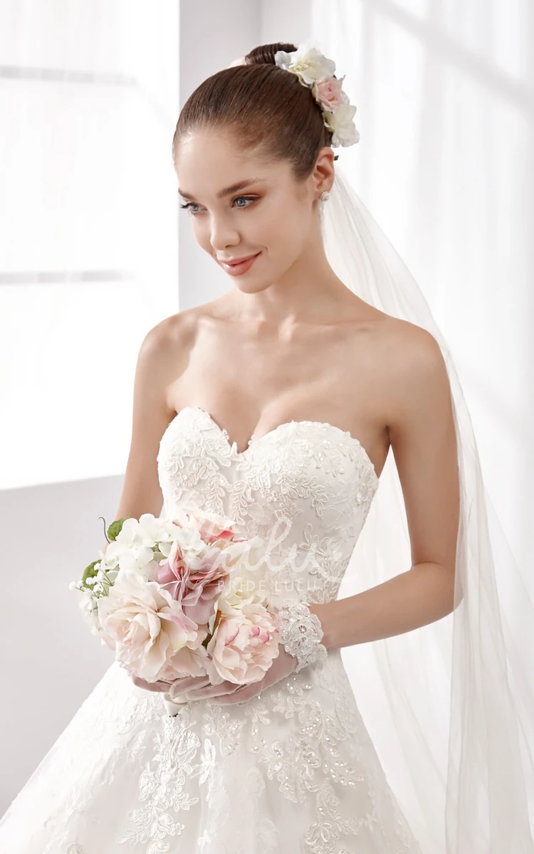 Sweetheart Lace A-Line Wedding Dress with Beaded Appliques and Brush Train