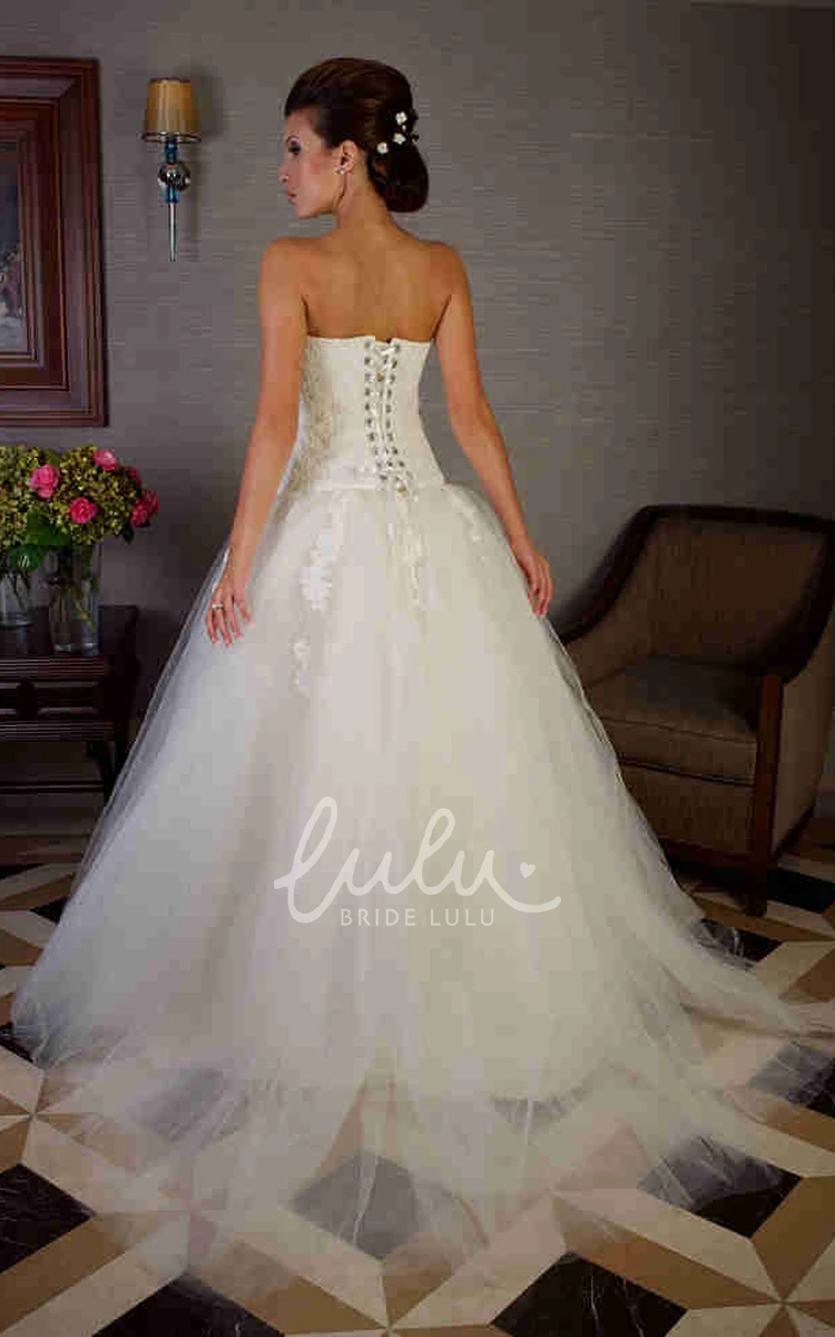 Tulle Ball Gown Wedding Dress with Appliques and Strapless Neckline Floor-Length and Elegant