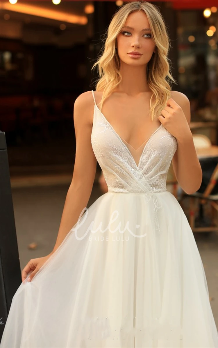 Romantic A Line Tulle Wedding Dress with Spaghetti Straps and Criss Cross Elegant Bridal Gown