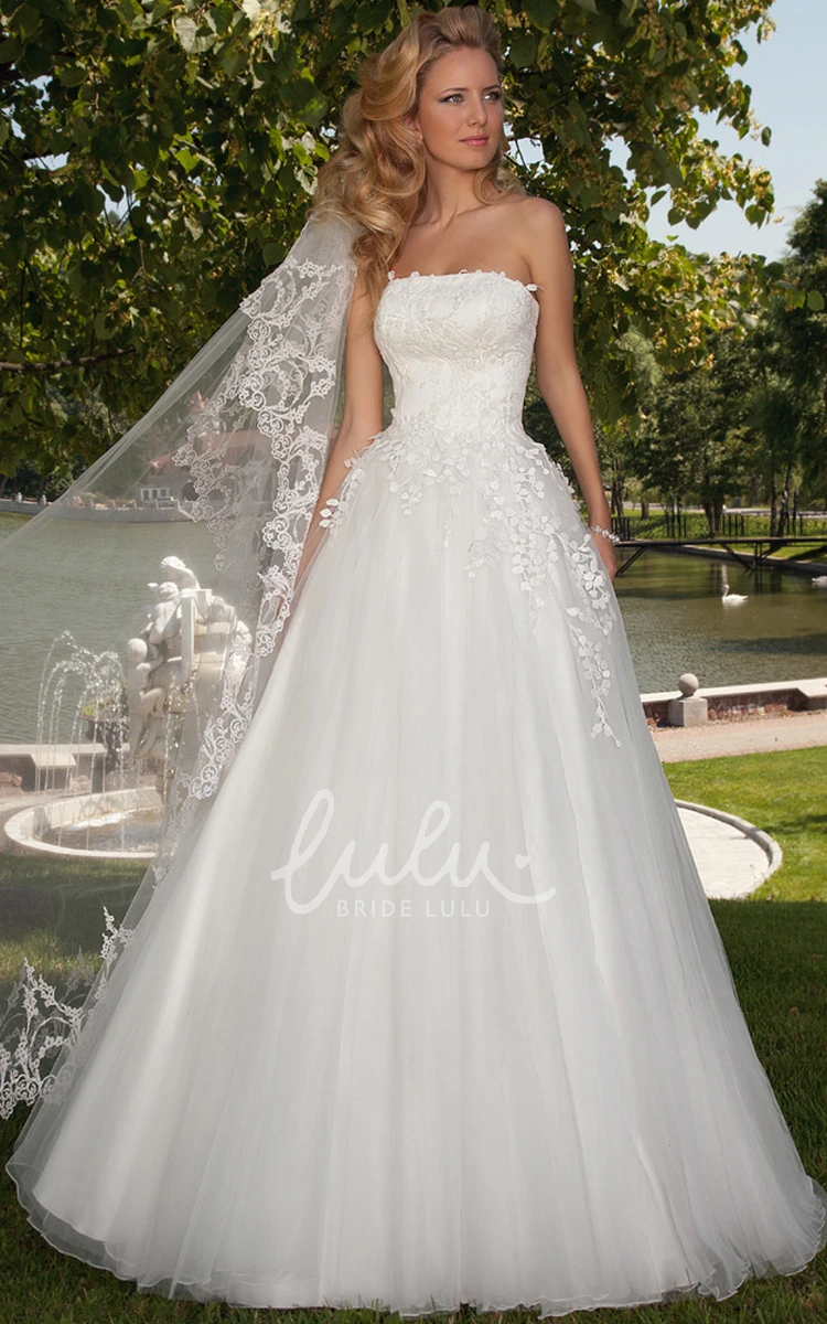 A-Line Strapless Tulle Wedding Dress with Appliques and Corset Back Long Flowy Bridal Gown
