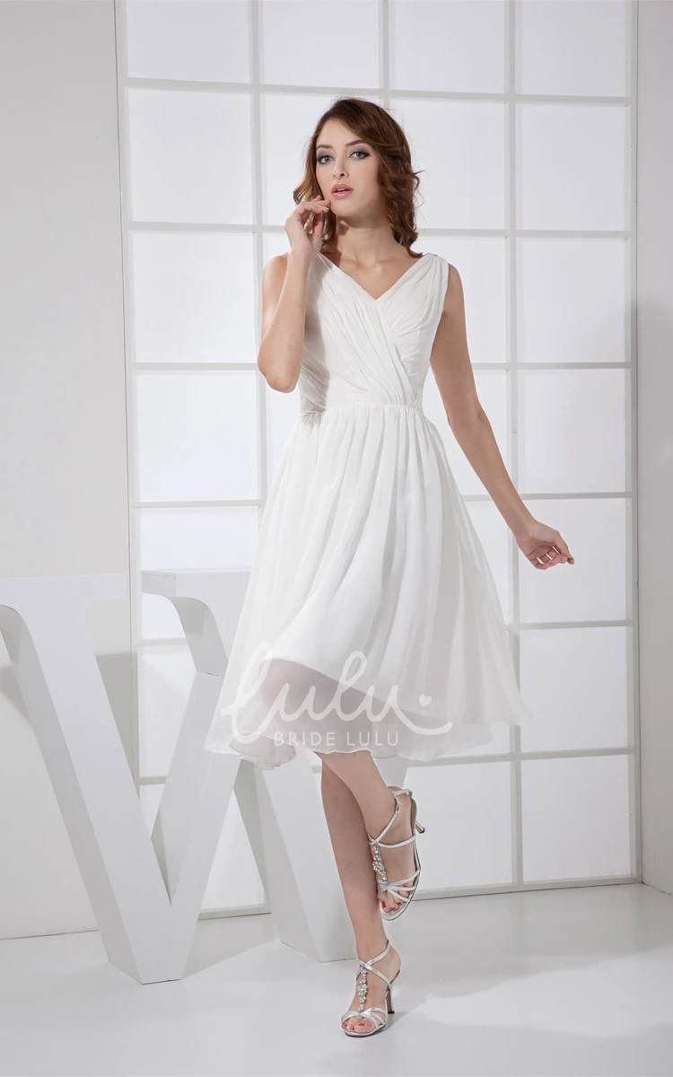 Knee-Length Pleated Dress with Ruching Chic & Flattering