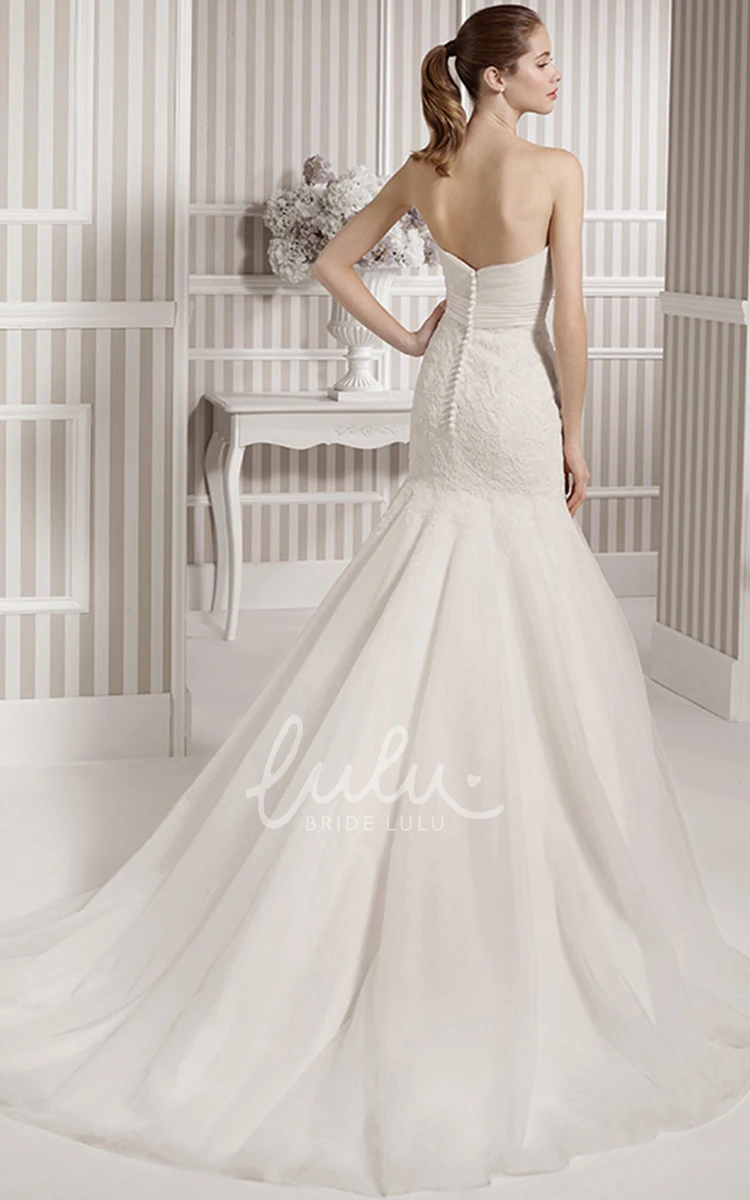 Sweetheart Tulle Trumpet Wedding Dress with Appliques and Criss Cross Elegant Bridal Gown