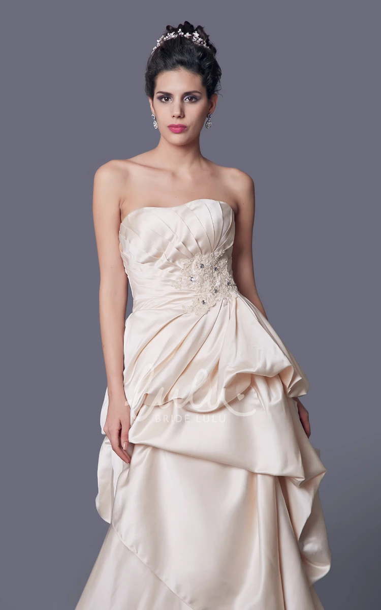 A-line Satin Long Wedding Dress with Strapless Sleeveless Neckline and Ruffled Design