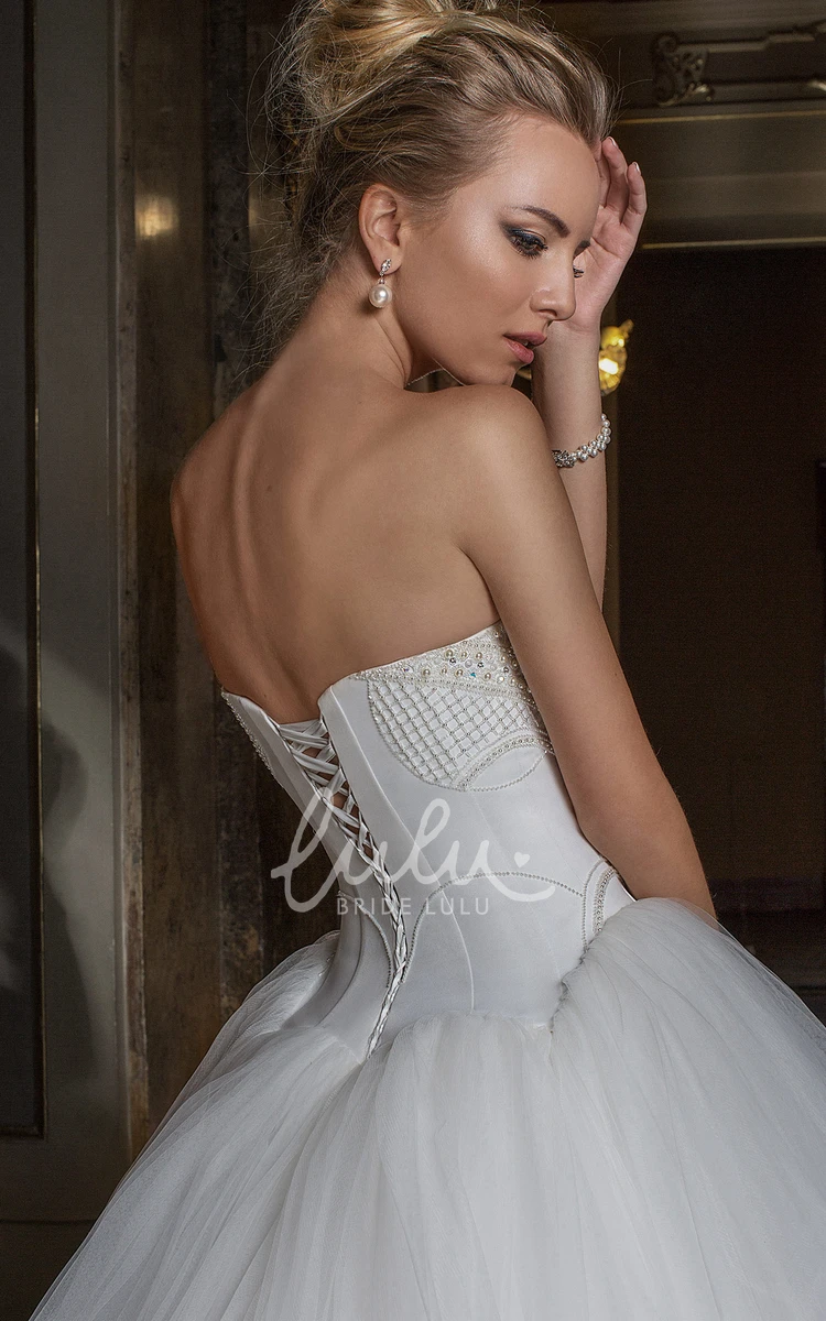 Sweetheart Beaded Tulle Wedding Dress with Brush Train Sleeveless Ball Gown