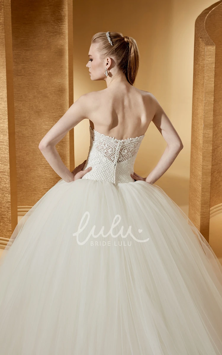 Sleeveless Ball Gown with Embroideries and Open Back Elegant and Modern