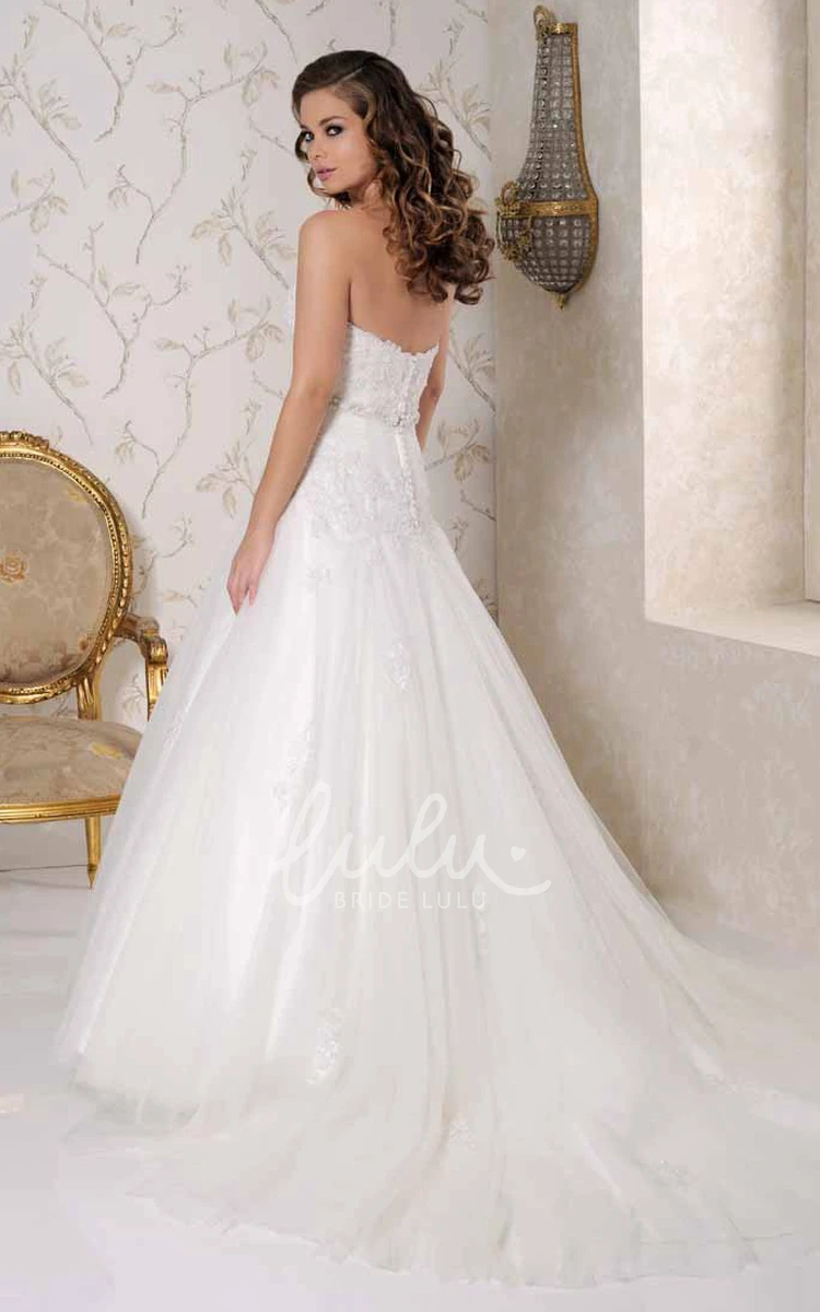 Sweetheart Appliqued Tulle Wedding Dress with Chapel Train and Backless Stunning Bridal Gown