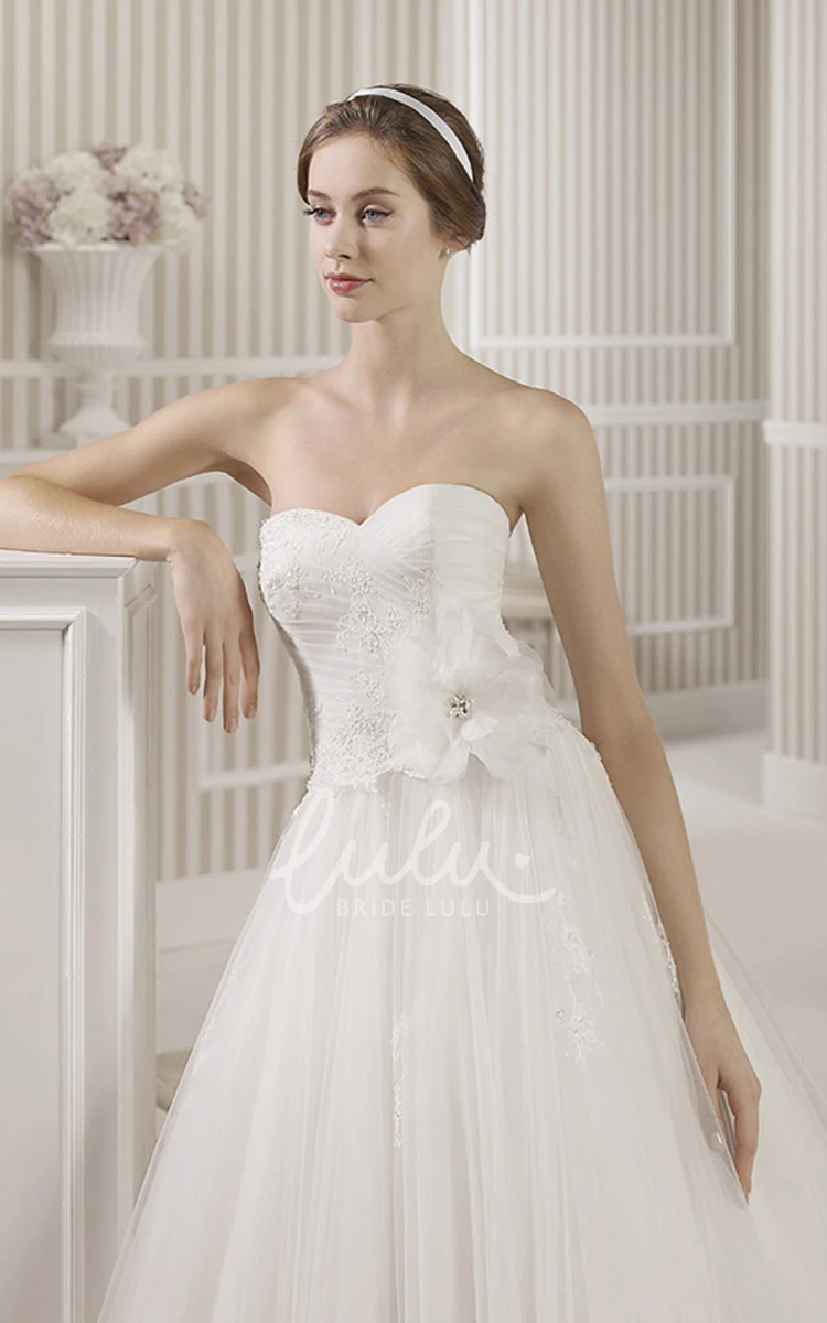 Sweetheart Ball Gown Wedding Dress with Tulle Appliques and Criss Cross